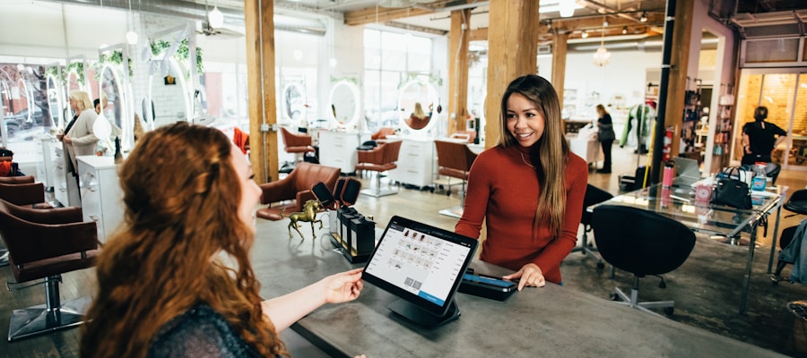 Small business owner using a tablet in their shop to manage AI-powered automation tools