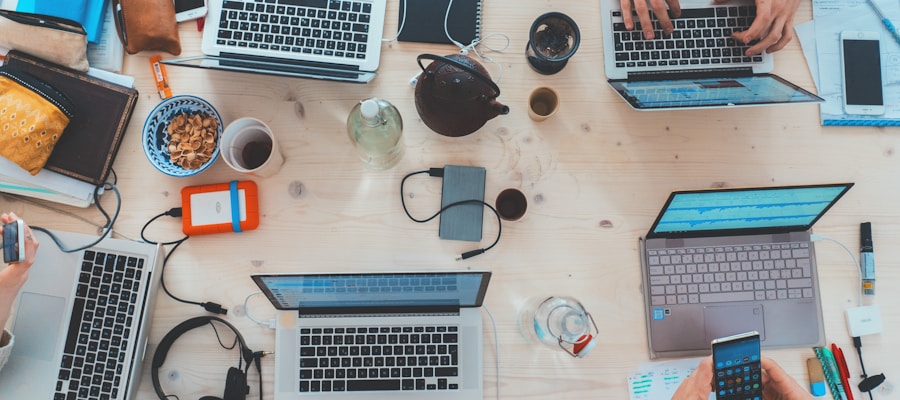 Digital transformation business technology - team collaborating with modern devices and data dashboards